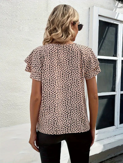 Emily – bluse mit allover-print und rüschenbesatz